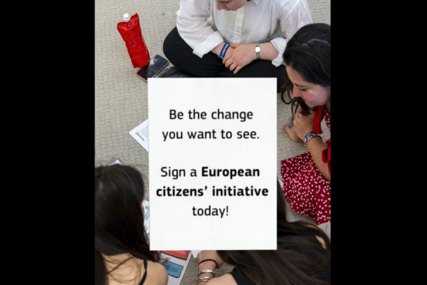 Four people sit in a circle on the floor, with a poster overlay in the center reading, "Be the change you want to see. Sign a European citizens’ initiative today!.